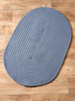 Northshire Solid Color Oval Braided Wool Rug