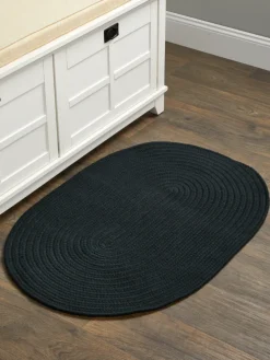 Northshire Solid Color Oval Braided Wool Rug