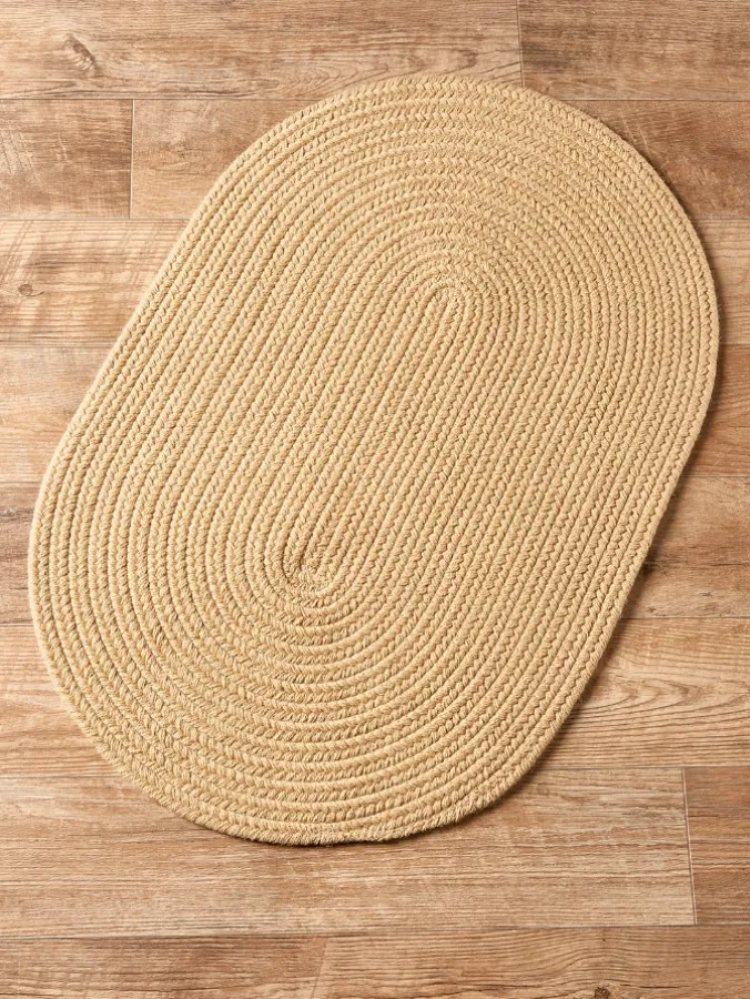 Northshire Solid Color Oval Braided Wool Rug