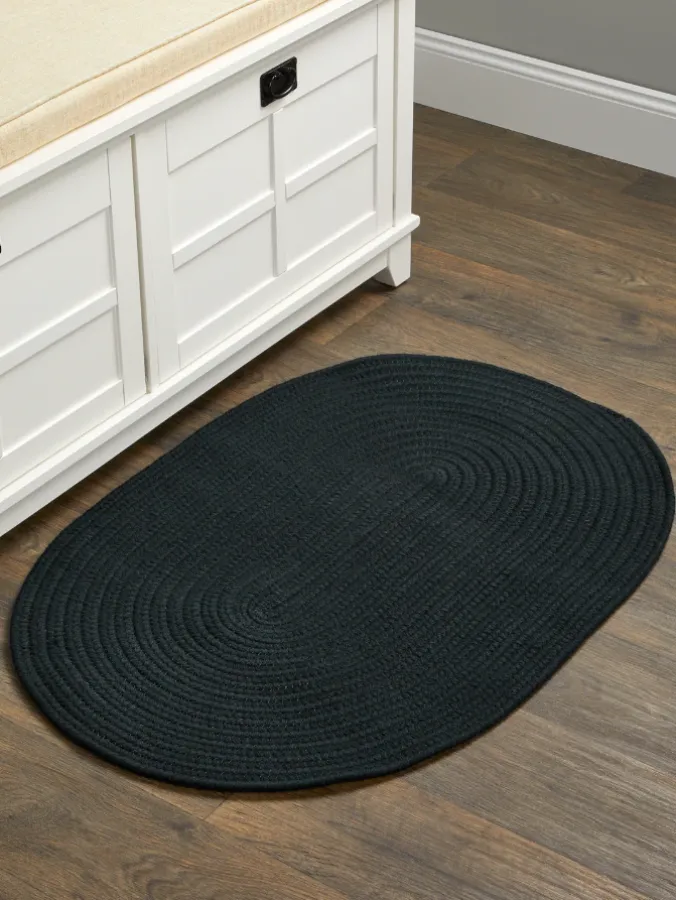 Northshire Solid Color Oval Braided Wool Rug
