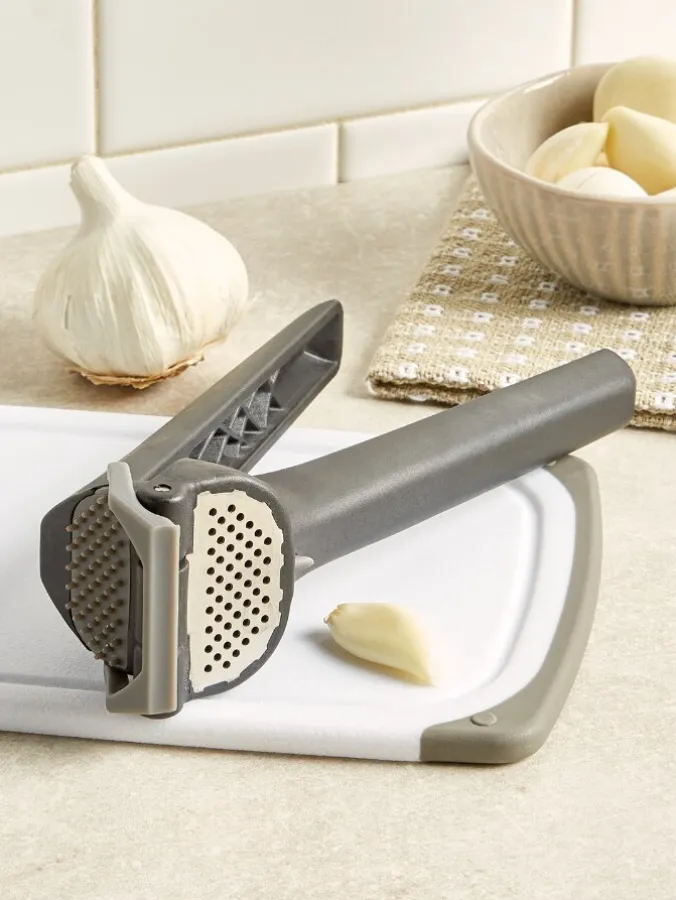 Self-Cleaning Garlic Press